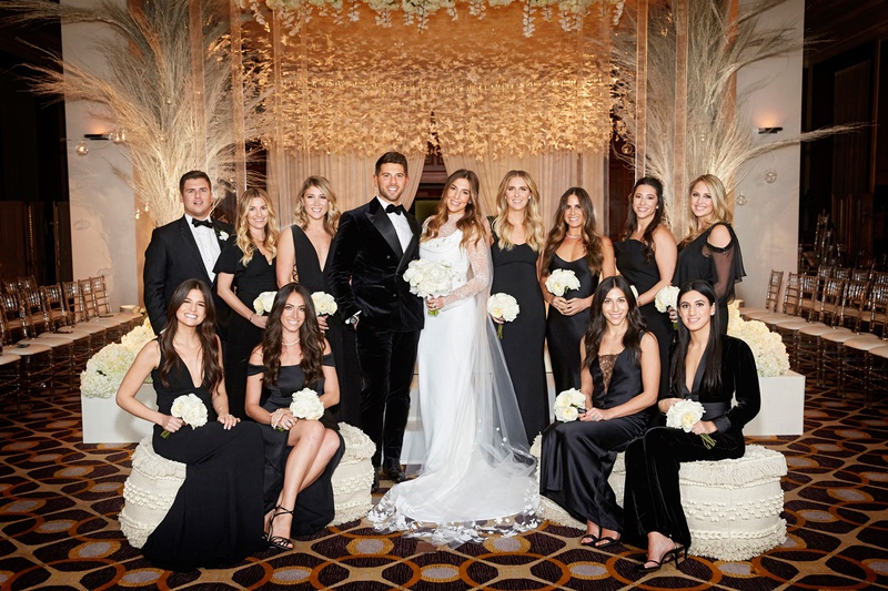 Black %26 White Attire for Wedding Party
Photography: KingenSmith
Read More:
http://www.insideweddings.com/weddings/luxurious-wedding-featuring-sentimental-butterfly-decor-in-chicago/1348/ bride in vera wang wedding dress groom velvet tuxedo bridesmaids in black mismatch dresses ceremony