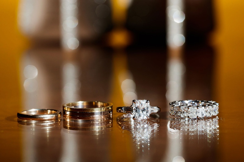 Radiant-Cut Engagement Ring with Other Rings
Photography: Bob %26 Dawn Davis Photography
Read More:
http://www.insideweddings.com/weddings/modern-glamorous-jewish-wedding-with-unique-decor-in-chicago/1154/ Wedding rings for groom and engagement ring radiant baguette two side stones eternity band diamonds