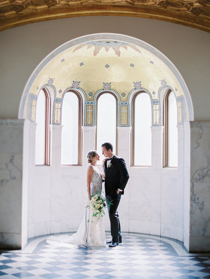 Newlyweds at Vibiana
Photography: Steve Torres Photography
Read More:
http://www.insideweddings.com/weddings/romantic-inspirational-shoot-at-a-historic-venue-in-downtown-la/724/ Bride in "Carla" from JINZA Couture Bridal 2016 Collection, groom in tux under Vibiana's mosaic nook