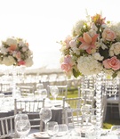 Ivory %26 Coral Tall Centerpieces
Photography: Fusion Estudio
Read More:
http://www.insideweddings.com/weddings/destination-wedding-with-coral-ivory-grey-color-scheme-in-mexico/766/ Crystal centerpiece designs with white hydrangea, orange lily, pink rose flowers and hanging crystal