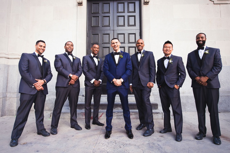Happy Groomsmen in Front of Venue
Photography: Callaway Gable
Read More:
http://www.insideweddings.com/weddings/modern-in-the-round-ceremony-whimsical-garden-inspired-reception/1155/ wedding portraits groom and groomsmen navy suits black bow ties shoes in front of vibiana