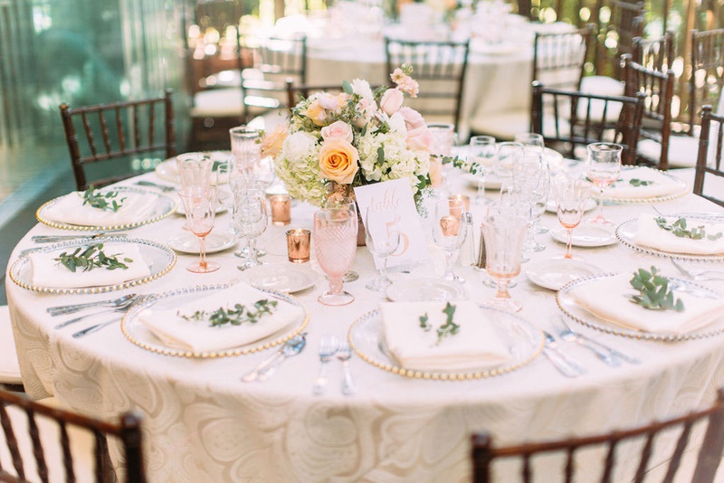Low Centerpiece %26 Pink Drinkware
Photography: Ashley Paige Photography
Read More:
http://www.insideweddings.com/weddings/elegant-outdoor-fall-wedding-at-a-rustic-chic-venue-in-malibu/1244/ wedding reception round table wood chair low centerpiece pink antique crystal goblets greenery plate