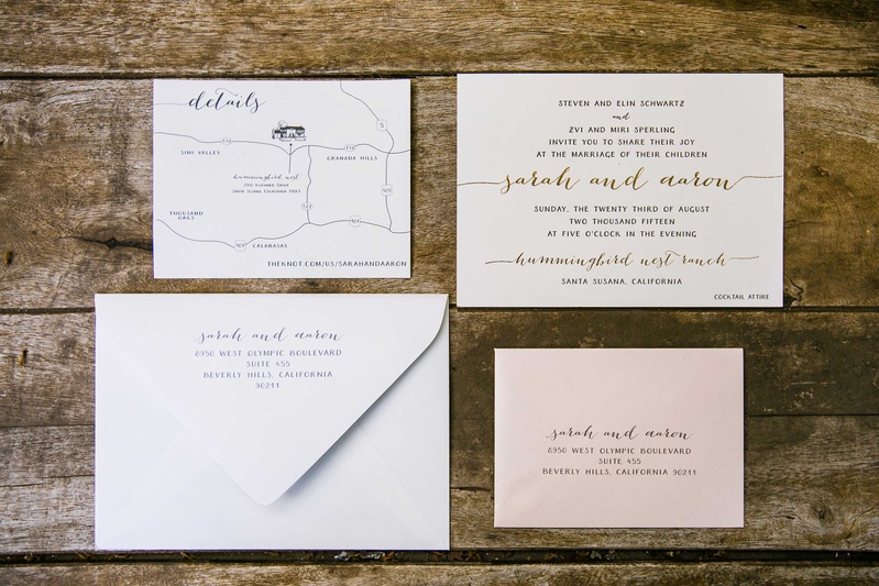 White, Pink, and Gold Invitation Suite
Photography: Callaway Gable
Read More:
http://www.insideweddings.com/weddings/alfresco-summer-wedding-with-lush-foliage-accents-in-california/805/ a white and pink invitation suite with silver and gold calligraphy