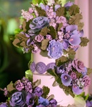 Purple Sugar Flowers
Photography: Gruber Photographers
Read More:
http://www.insideweddings.com/weddings/contemporary-fall-wedding-at-the-new-york-public-library/358/ Rose and calla lily flowers made of sugar on wedding cake