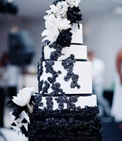 Modern Black and White Ruffle Cake
Photography: Kortnee Kate
Read More:
http://www.insideweddings.com/weddings/black-and-white-modern-wedding-with-unique-details-in-cincinnati/698/ Black and white cake with ruffles, sugar flowers, and ribbons