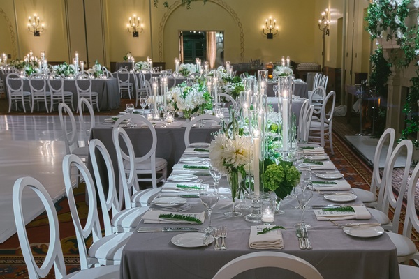 outdoor jewish ceremony with white green color palette round and rectangle tables for reception