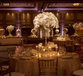 Blush %26 Ivory Reception at Grand Del Mar
Photography: Boyd Harris Photographs
Read More:
http://www.insideweddings.com/weddings/a-jeweled-floral-wedding-at-fairmont-grand-del-mar-in-san-diego/745/ Wedding reception tables with flower and jewel centerpieces featuring orchids and roses