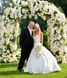 Bride and Groom at Garden Ceremony
Photography: Brett Matthews Photography
Read More:
http://www.insideweddings.com/weddings/romantic-fairy-tale-castle-wedding-in-new-york/389/ Bride in a strapless Pnina Tornai gown with groom in a black tuxedo and white bow tie at floral arch