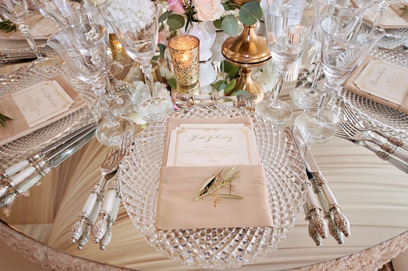 Crystal Charger Plate %26 Opulent Flatware
Photography: Carasco Photography
Read More:
http://www.insideweddings.com/weddings/traditional-ceremony-glamorous-garden-inspired-tented-reception/943/ Mirror table cut crystal charger plate menu in napkin gold candle votives and white silver flatware