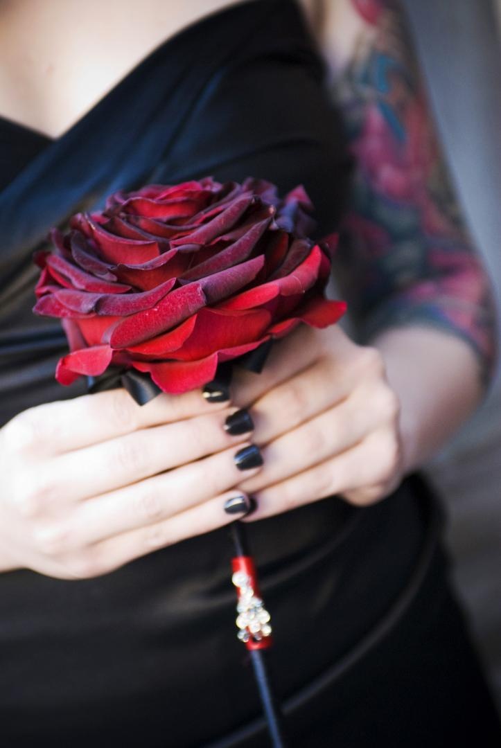 Bridesmaid's Bloom
Photography: Barnet Photography
Read More:
http://www.insideweddings.com/weddings/ashley-reeves-and-brandon-saller/261/ Bridesmaid holds a single black Baccara rose