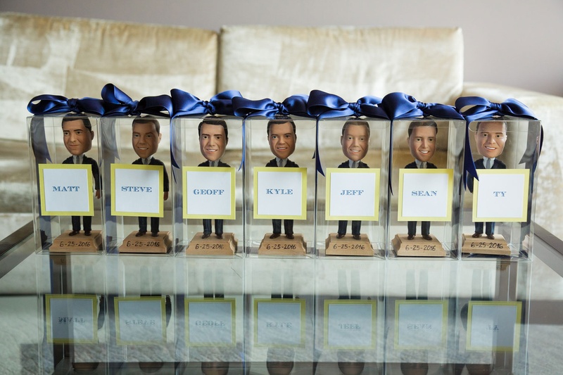 Custom Bobbleheads for Groomsmen
Photography: Bob %26 Dawn Davis Photography
Read More:
http://www.insideweddings.com/weddings/church-ceremony-colorful-tented-reception-at-a-private-residence/1025/ Groomsman gift custom personalized bobble heads in clear box blue ribbon