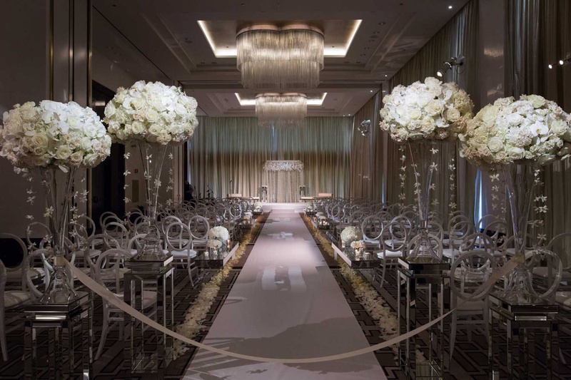 Ivory Flowers at Chicago Ballroom Ceremony
Photography: Studio This Is
Read More:
http://www.insideweddings.com/weddings/glamorous-city-style-real-wedding-at-a-luxury-hotel-in-chicago/1217/ chicago ballroom ceremony venue chandeliers white flowers orchids roses hydrangea round back chairs