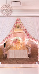 Parted Curtain Lined with Flowers
Photography: SYPhotography
Read More:
http://www.insideweddings.com/weddings/an-intimate-styled-shoot-with-a-pale-pink-palette-in-chicago/1034/ curtain parted and lined with pink and white flowers separating rooms of wedding reception