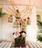 Bird Cage Reception Decoration
Photography: Joe Buissink Photography
Read More:
http://www.insideweddings.com/weddings/vintage-seaside-wedding-at-the-ritz-carlton-in-california/320/ Escort card table display gold bird cages on tree branch