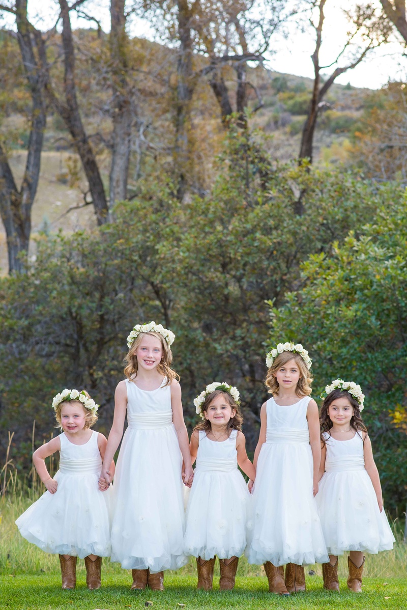 Flower Girls with Crowns %26 Boots
Photography: Brett Butterstein Photography
Read More:
http://www.insideweddings.com/weddings/incredible-tented-ceremony-barn-reception-at-ranch-in-aspen/860/ Five flower girls wearing white dresses with flower crowns and brown cowboy boots Aspen wedding