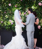 Bride %26 Groom at Alfresco Ceremony
Photography: Full Spectrum Photography
Read More:
http://www.insideweddings.com/weddings/a-modern-san-diego-hotel-wedding-with-purple-sparkling-details/672/ Bride in a fit-and-flare Vera Wang dress, ruffled skirt and groom in grey suit exchange vows