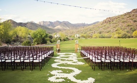 Scottsdale Golf Club Ceremony
Photography: Trevor Dayley
Read More:
http://www.insideweddings.com/weddings/spring-wedding-at-tuscan-inspired-golf-club-in-scottsdale-arizona/814/ Silverleaf Club wedding ceremony with white flower petal aisle and mountains in background