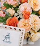 Peach Rustic Wedding Centerpiece
Photography: frame.thirty.six photography
Read More:
http://www.insideweddings.com/weddings/thea-andrews-and-jay-wolf/231/ Pink, orange, and yellow rose and peony flower arrangmeent
