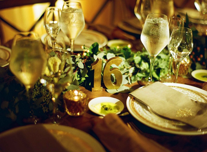 Brass Table Number for Rustic Wedding
Photography: Gabe Aceves Photography
Read More:
http://www.insideweddings.com/weddings/warm-cozy-wedding-at-unique-warehouse-venue-in-washington-dc/902/ Wood table with eucalyptus leaf greenery runner and brass table number 16 sculpture