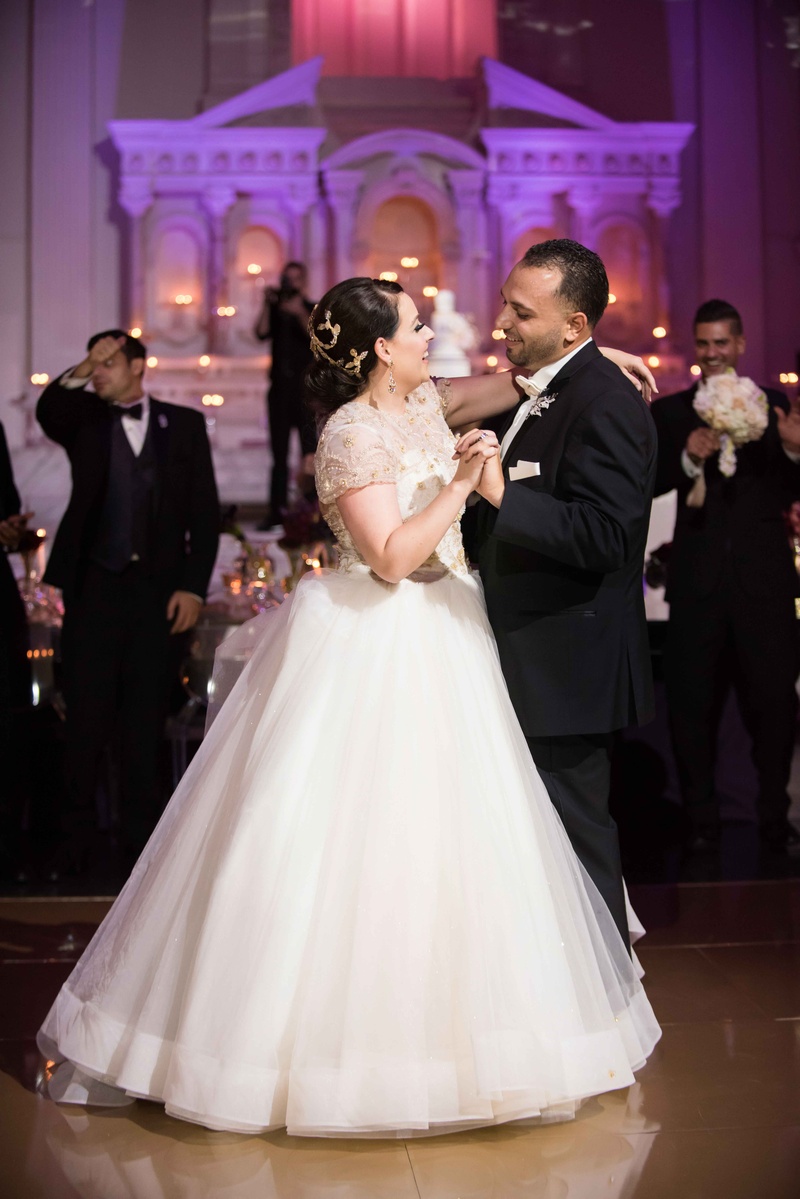 Bride in Ball Gown During First Dance
Photography: KLK Photography
Read More:
http://www.insideweddings.com/weddings/greek-orthodox-church-ceremony-glamorous-purple-gold-reception/730/ Bride in Lazaro wedding dress ball gown from Mon Amie Bridal Salon during first dance at Vibiana