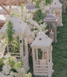 Alfresco Ceremony Aisle
Photography: Kris Kan
Read More:
http://www.insideweddings.com/weddings/lauren-kitt-and-nick-carter/605/ Floral markers at Nick Carter and Lauren Kitt's wedding
