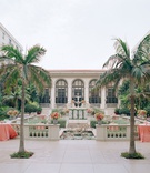 Cocktail Hour in The Breakers Courtyard
Photography: Jose Villa
Read More:
http://www.insideweddings.com/weddings/opulent-destination-wedding-with-luxe-tropical-decor-in-palm-beach/1158/ Wedding reception cocktail hour palm trees coral linens and flowers the breakers palm beach