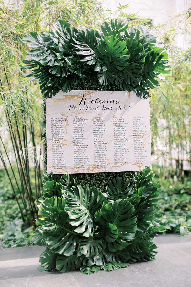 Marble Seating Chart on Tropical Display
Photography: Lauren Gabrielle Photography
Read More:
http://www.insideweddings.com/weddings/summer-real-wedding-featuring-tropical-decor-at-an-art-museum/1328/ monstera leaves tropical decor seating chart marble design inspired by invitations
