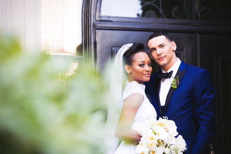 Bride in High-Neck Gown with Groom
Photography: Callaway Gable
Read More:
http://www.insideweddings.com/weddings/modern-in-the-round-ceremony-whimsical-garden-inspired-reception/1155/ African American couple wedding at vibiana blue tuxedo black lapel high neck lace bridal gown