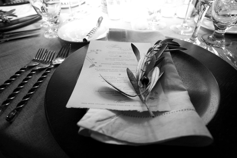 Olive Branch Place Setting
Photography: Simone %26 Martin Photography
Read More:
http://www.insideweddings.com/weddings/sophisticated-autumn-inspired-wedding-in-napa-valley-california/262/ Black and white photo of olive branch at wedding place setting