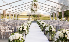 Clear Tent Wedding in Aspen
Photography: Perez Photography
Read More:
http://www.insideweddings.com/weddings/incredible-tented-ceremony-barn-reception-at-ranch-in-aspen/860/ Open side clear tent wedding ceremony ranch aspen colorado white flowers antlers decor lanterns