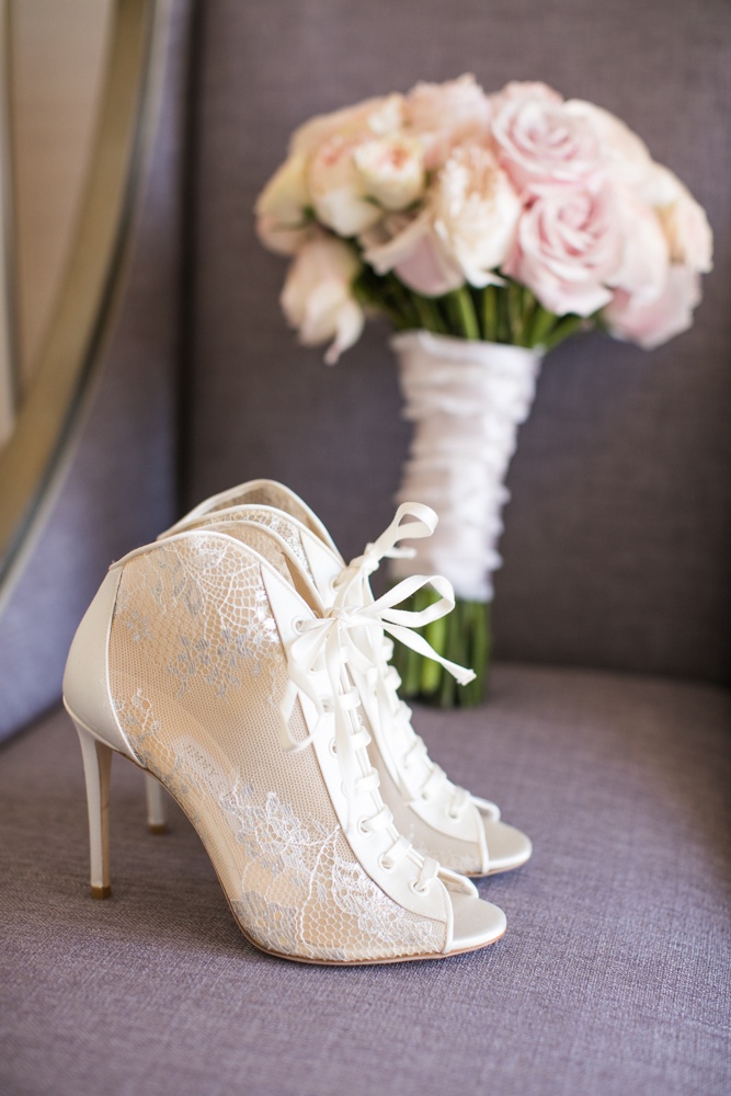 Lace Booties for Wedding Shoes
Photography: Samuel Lippke Studios
Read More:
http://www.insideweddings.com/weddings/outdoor-jewish-wedding-ceremony-luxe-reception-in-california/1160/ Bride's lace-up booties peep toe wedding heels shoes ivory design pink bouquet