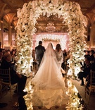 Bride with Parents Under Arches
Photography: The Day by Ira Lippke
Read More:
http://www.insideweddings.com/weddings/opulent-luxury-wedding-with-timeless-color-palette-in-new-york-city/1199/ the plaza wedding ceremony flower arch mirror aisle jewish wedding ceremony