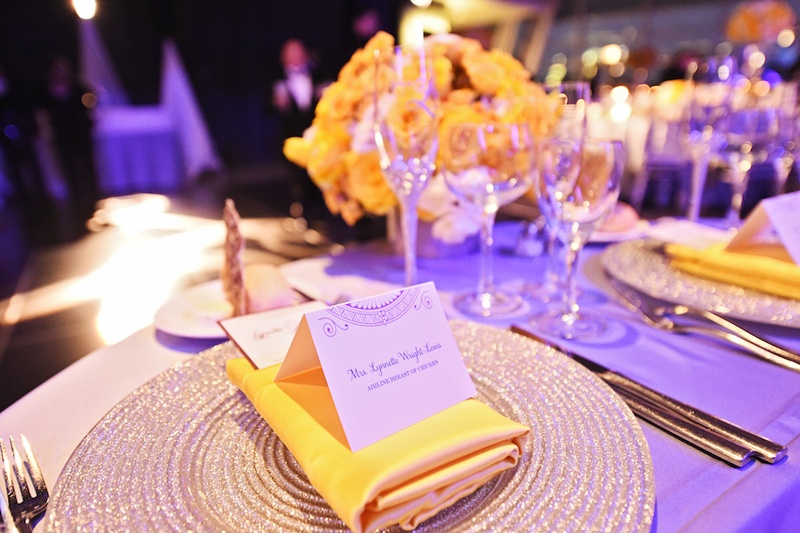 Fanciful Place Card
Photography: Carasco Photography
Read More:
http://www.insideweddings.com/weddings/city-wedding-at-chicago-planetarium-with-purple-yellow-palette/688/ Wedding reception place setting with silver charger, yellow napkin, place card with circular design