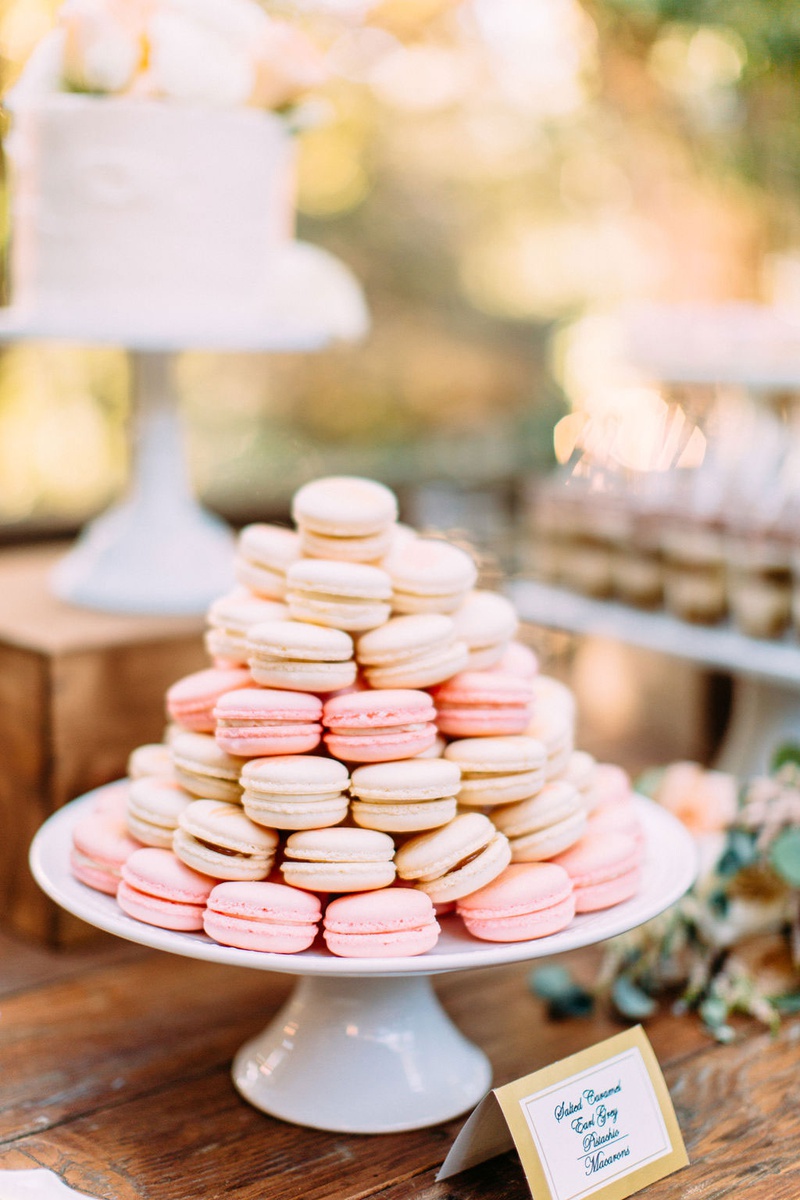 French Macaron Desserts on Cake Stand
Photography: Ashley Paige Photography
Read More:
http://www.insideweddings.com/weddings/elegant-outdoor-fall-wedding-at-a-rustic-chic-venue-in-malibu/1244/ wedding reception dessert table white cake stand with pink white macaron desserts