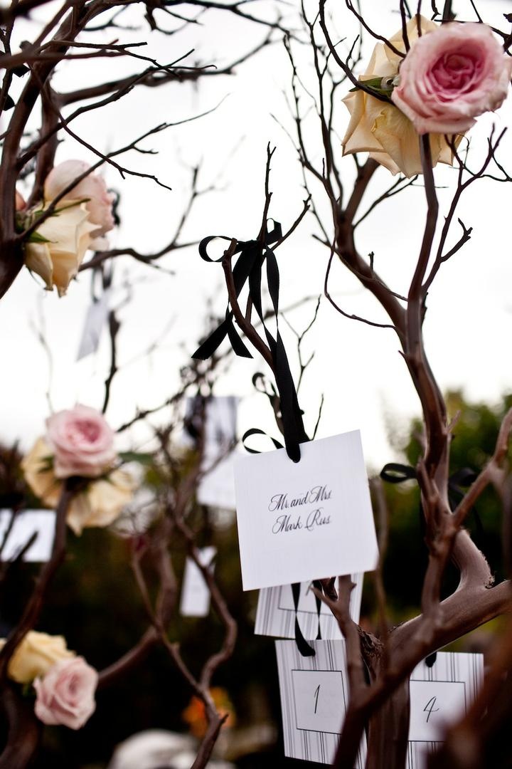 Tree Branch Seating Cards
Photography: Docuvitae
Read More:
http://www.insideweddings.com/weddings/canadian-american-wedding-in-malibu-california/393/ Escort cards hanging from Manzanita tree branches