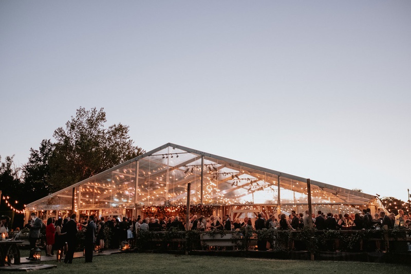 Tented Wedding Reception at Private Estate
Photography: Grant Daniels Photography
Read More:
http://www.insideweddings.com/weddings/outdoor-ceremony-tented-reception-with-cozy-fall-color-palette/1183/ wedding reception tent on private estate lawn string lights greenery guests