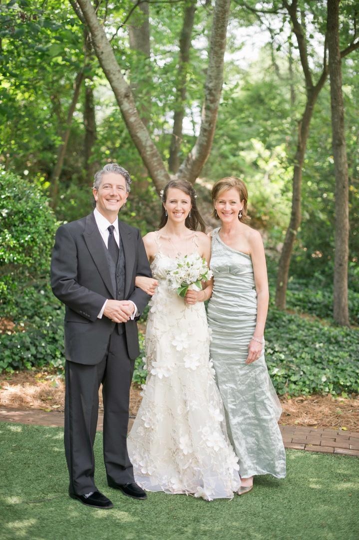 Asymmetrical Mother-of-Bride Dress
Photography: Harwell Photography
Read More:
http://www.insideweddings.com/weddings/romantic-woodland-inspired-atlanta-wedding-with-natural-details/433/ Bride with father and mother in light green dress