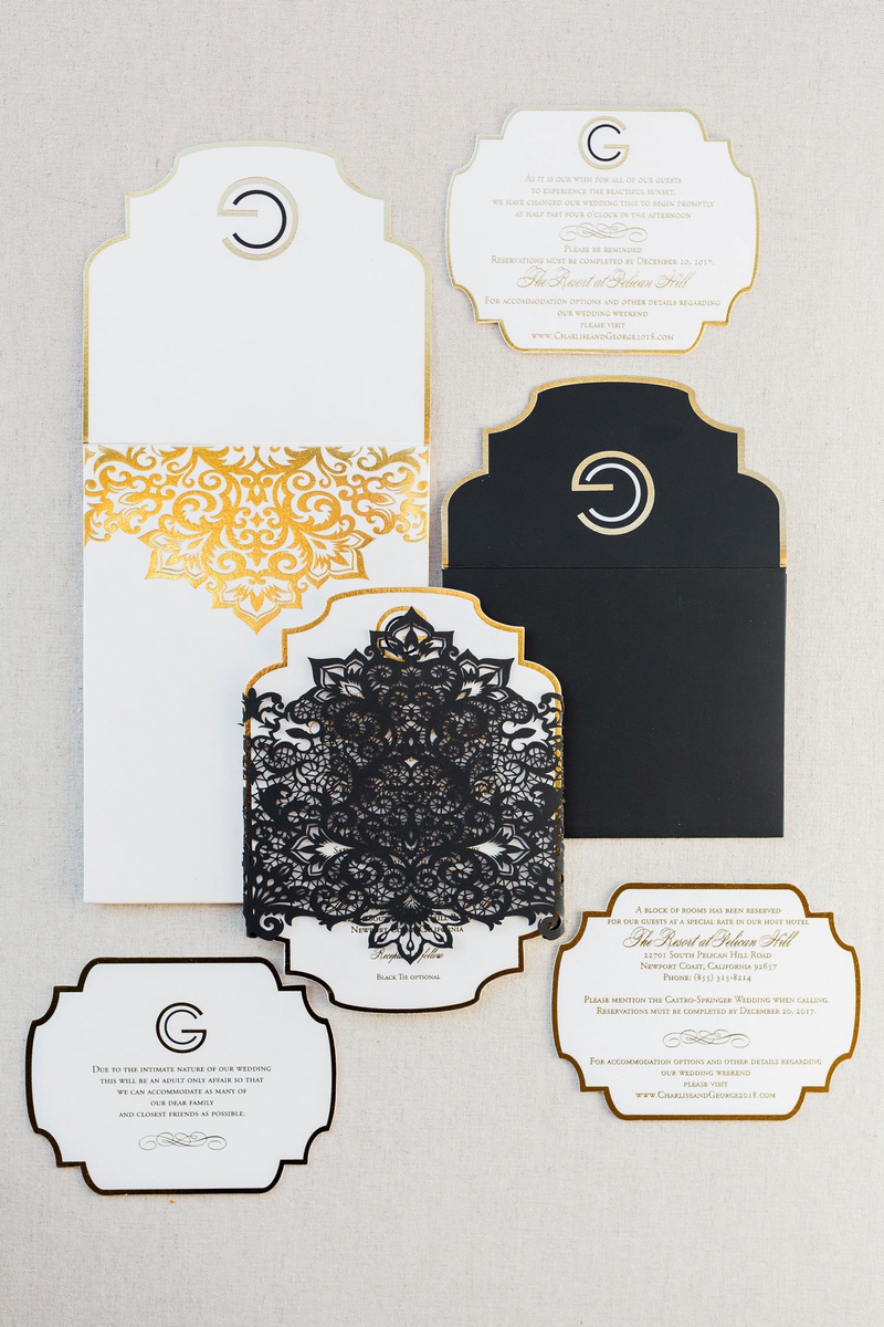 Ornate Black, White %26 Gold Invitation
Photography: Brett Hickman Photographers
Read More:
http://www.insideweddings.com/weddings/charlise-castro-and-george-springer-iii/1165/ Charlise Castro and Houston Astros mlb player George Springer III white gold invitation suite lace