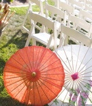 Summer Ceremony Parasols
Photography: Joe Buissink Photography
Read More:
http://www.insideweddings.com/weddings/vintage-seaside-wedding-at-the-ritz-carlton-in-california/320/ Orange and white paper parasols for wedding guests