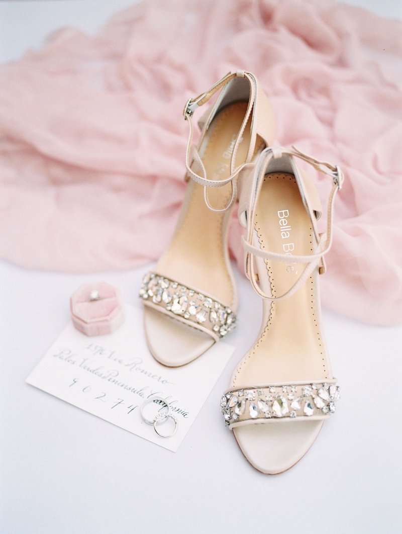 Crystal Heels with Ankle Straps
Photography: Anya Kernes Photography
Read More:
http://www.insideweddings.com/weddings/outdoor-wedding-with-dusty-rose-powder-blue-lavender-palette/1288/ wedding shoes crystal details on strappy high heels ankle straps invitation pink ring box solitaire