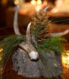 Hunting-Inspired Décor
Photography: Dalal Photography
Read More:
http://www.insideweddings.com/weddings/holiday-wedding-with-woodsy-winter-decor-elements/421/ Wood, antler, and pinecone centerpieces