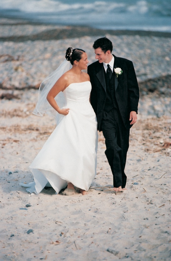 Barefoot Beach Couple
Photography: Barnet Photography
Read More:
http://www.insideweddings.com/weddings/seaside-celebration-in-orange-county-california/32/ Bride and groom walk on the beach in their wedding dress and tuxedo