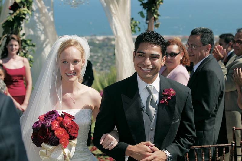 Newlyweds' Ceremony Recessional
Photography: Thomas J. Styczynski Photography
Read More:
http://www.insideweddings.com/weddings/alfresco-summer-wedding-in-santa-barbara-california/49/ Bride and groom walk up aisle of ocean-view ceremony