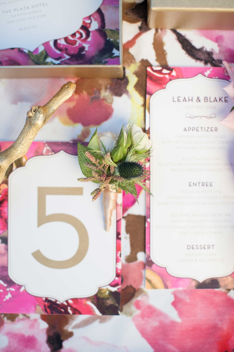 Floral Table Linen Topped with Calligraphy Menu
Photography: Thisbe Grace Photography
Read More:
http://www.insideweddings.com/weddings/dramatic-wedding-shoot-inspired-by-alexander-mcqueen-chanel/749/ floral print inspired by coco chanel table linen white and gold calligraphy on wedding menu
