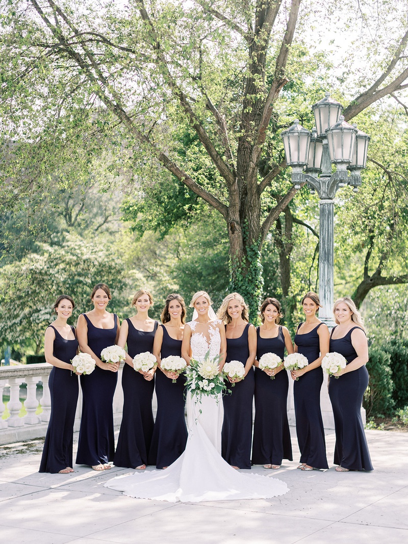 Bridesmaids in Matching Scoop-Neck Gowns
Photography: Lauren Gabrielle Photography
Read More:
http://www.insideweddings.com/weddings/summer-real-wedding-featuring-tropical-decor-at-an-art-museum/1328/ bride in illusion pronovias wedding dress with bridesmaids in scoop neck gowns bhldn white bouquets