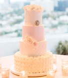 Blush, Silver %26 Gold Wedding Cake
Photography: Birds of a Feather
Read More:
http://www.insideweddings.com/weddings/church-ceremony-sparkling-pink-ballroom-reception-with-city-views/1084/ White wedding cake with blush silver and gold details flowers quilting candles roses simple topper