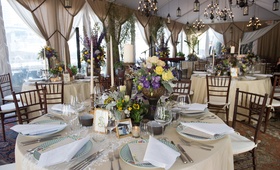 Champagne-Hued Circular Tablescape, Centerpieces
Photography: Elizabeth Solano for John Solano Photography
Read More:
http://www.insideweddings.com/weddings/colorful-spring-bridal-shower-on-a-rooftop-in-new-york-city/965/ champagne hued circular tablescape centerpiece purple yellow chandeliers new york city skyline