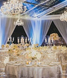 Beautifully Lit Reception Tent
Photography: LuvRox Photography
Read More:
http://www.insideweddings.com/weddings/luxurious-destination-wedding-at-the-ocean-club-in-the-bahamas/1324/ clear top reception tent with drapery, twinkle lights and chandliers