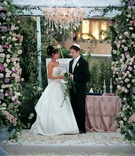 Garden-Inspired Chuppah
Photography: Lawrence Crandall Photography
Read More:
http://www.insideweddings.com/weddings/enchanted-garden-theme-wedding-at-balboa-bay-club-in-newport-beach/145/ Bride and groom under ceremony canopy