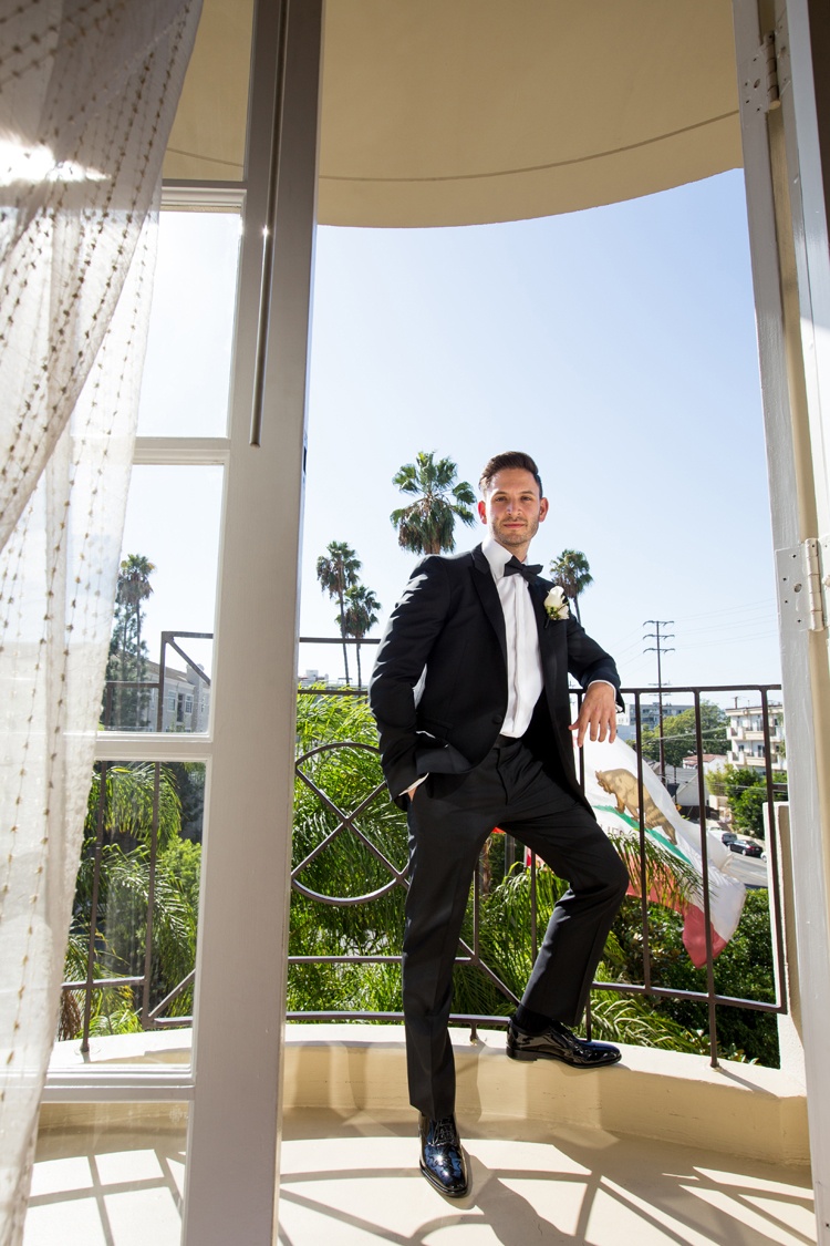 Groom on Hotel Balcony
Photography: Duke Photography
Read More:
http://www.insideweddings.com/weddings/jewish-ceremony-classic-ballroom-reception-in-beverly-hills/922/ groom in lanvin tuxedo stands on balcony of hotel